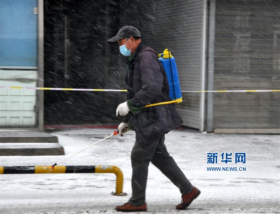 （社会）（3）青岛：风雪守“疫”线